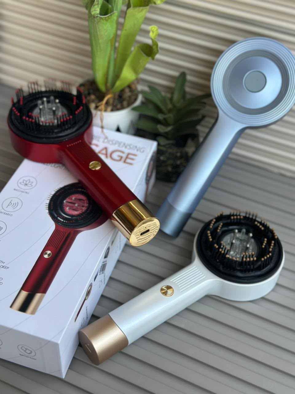 Magnetic oil dispenser massage comb