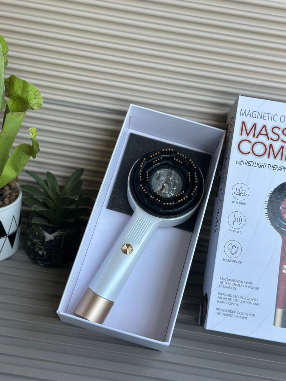 Magnetic oil dispenser massage comb