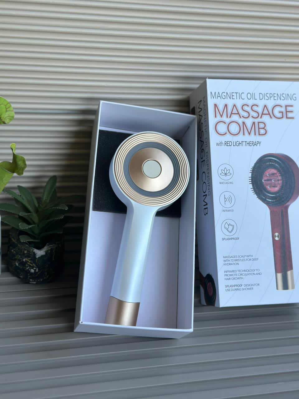Magnetic oil dispenser massage comb